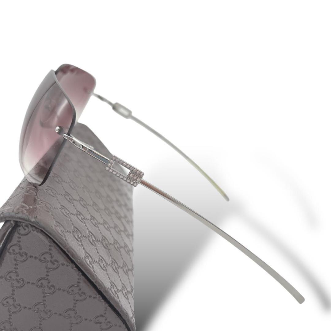 小物 GUCCI sunglasses rimless stone silver