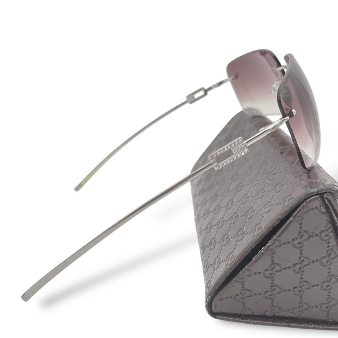 小物 GUCCI sunglasses rimless stone silver