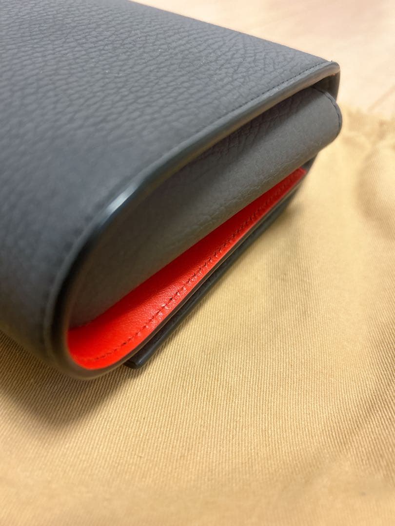 グレー レザー スタッズ クラッチバッグ