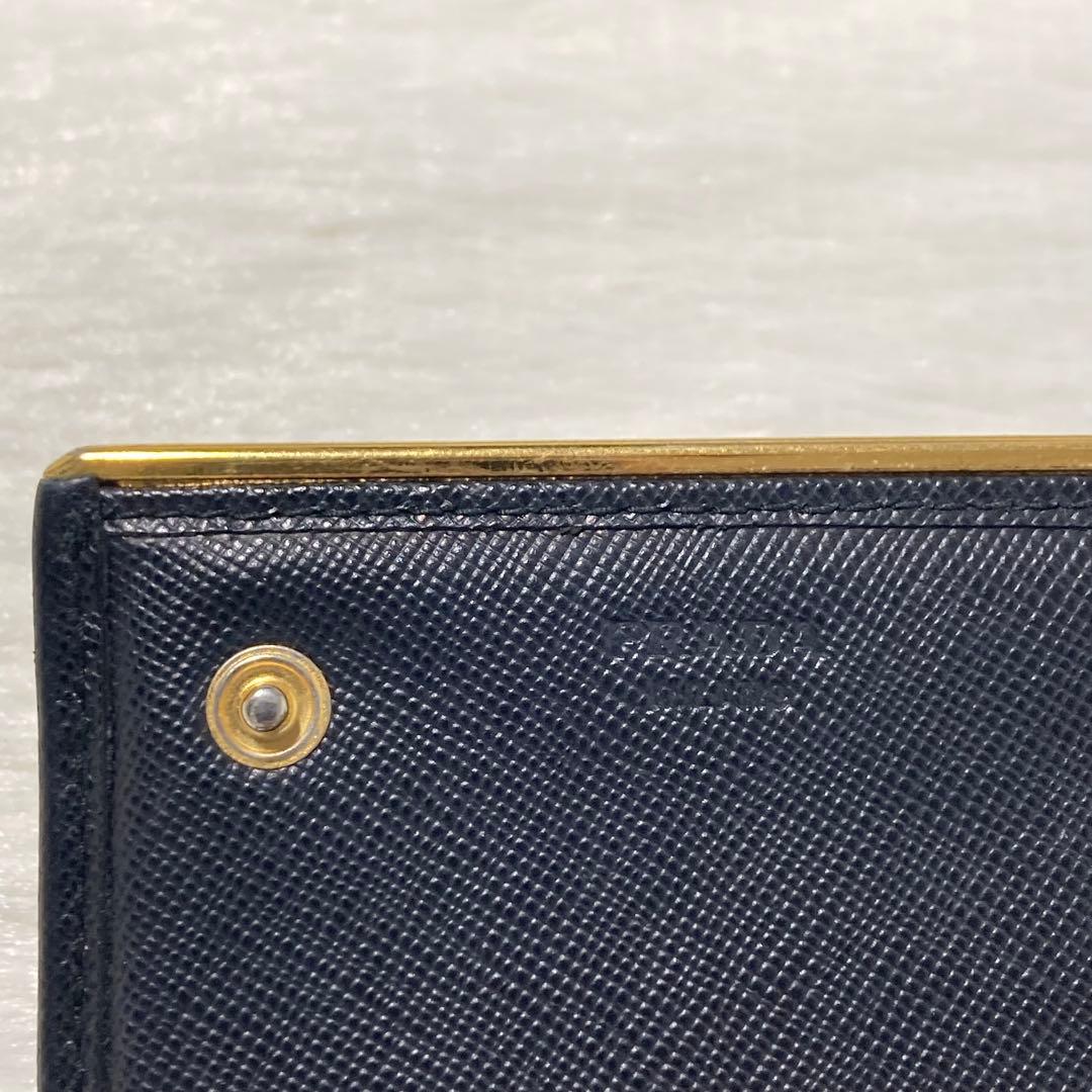 早い者勝ち　PRADA プラダ　二つ折り　ロングウォレット　プレート　黒　大人気