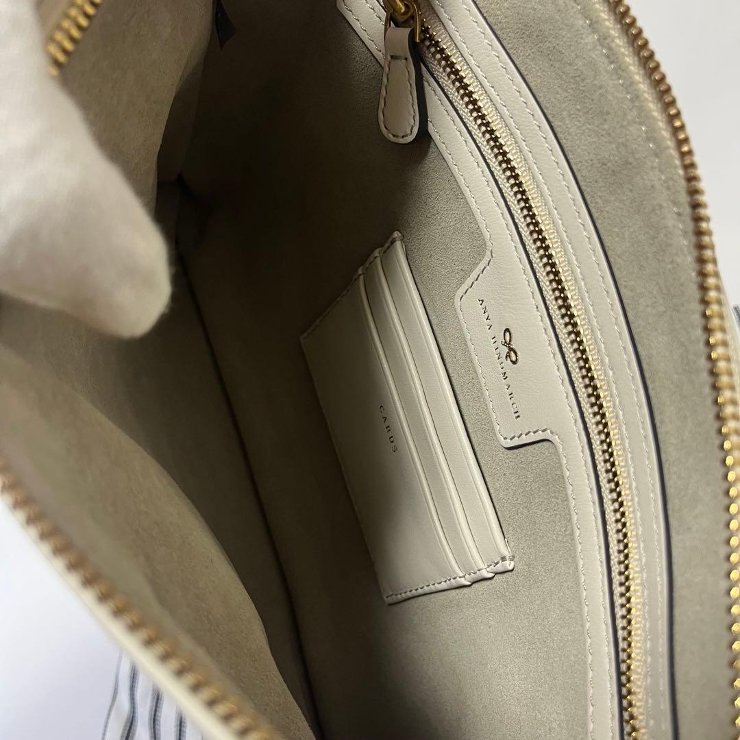 ANYA HINDMARCH ステッカーデザイン クラッチバッグ　フリンジ