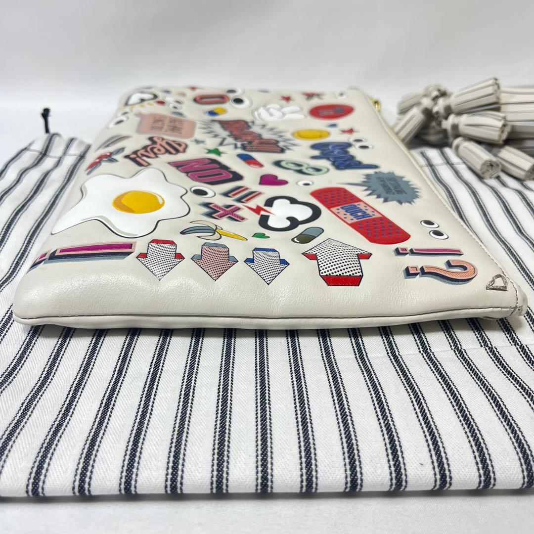 ANYA HINDMARCH ステッカーデザイン クラッチバッグ　フリンジ