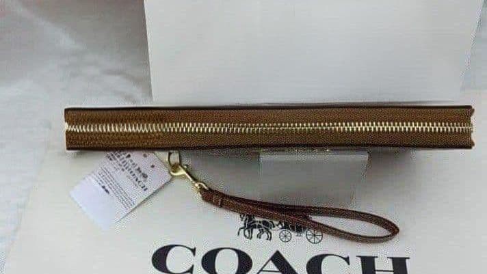 新品未使用コーチ長財布スヌーピー柄ストラップブラウンレディースメンズ送料無料