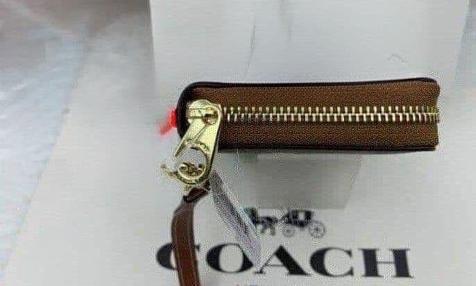 新品未使用コーチ長財布スヌーピー柄ストラップブラウンレディースメンズ送料無料