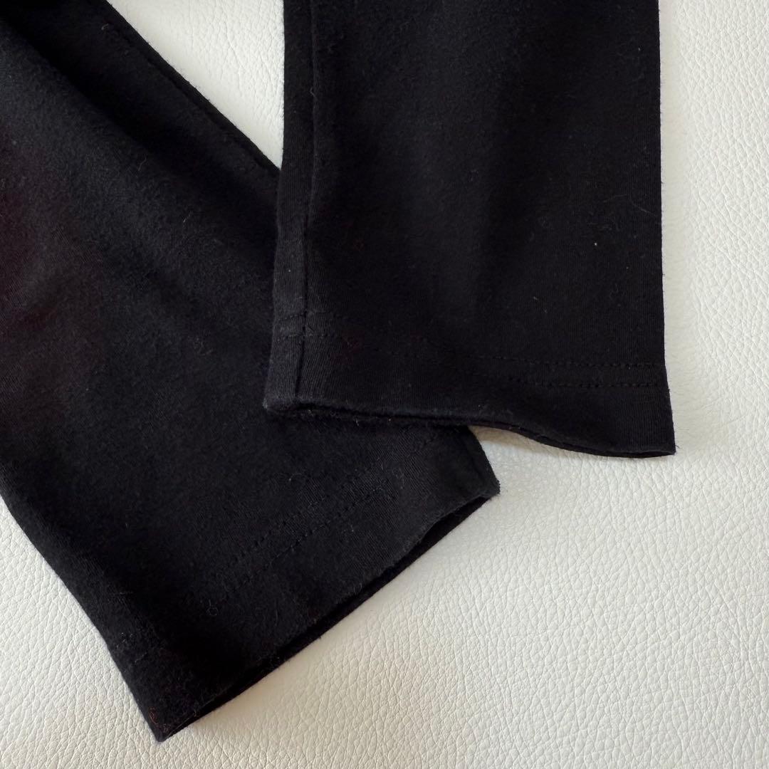 トクコプルミエヴォル アートプリント ハイネック チュニック 黒 人物柄 日本製