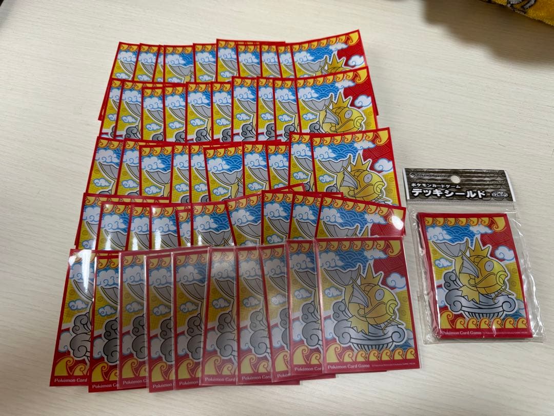 ポケモンカード デッキシールド 金のコイキング 50枚+未使用10枚