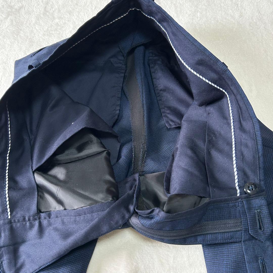 美品 ユニバーサルランゲージ カノニコ スーパーソニック ダブルスーツ M 紺