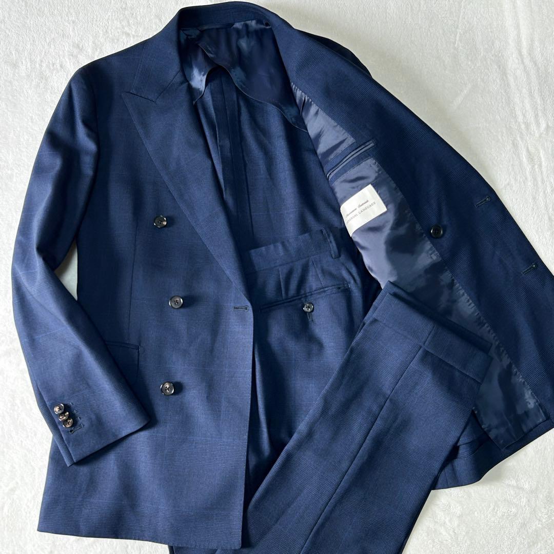 美品 ユニバーサルランゲージ カノニコ スーパーソニック ダブルスーツ M 紺