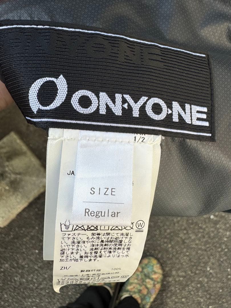 オンヨネ　レインジャケット　サロモンチーム