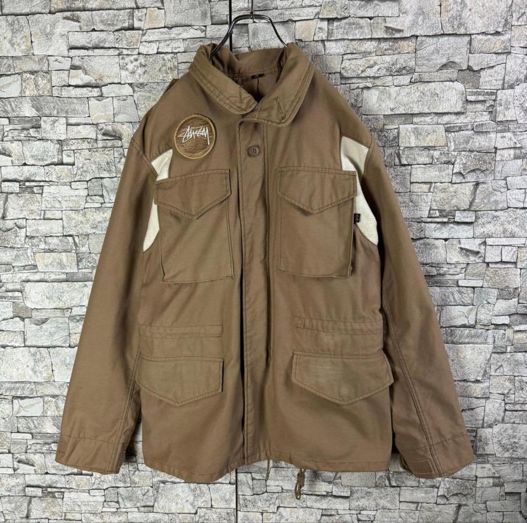 【超希少25周年記念M-65,】STUSSY ALPHA コラボ ジャケット