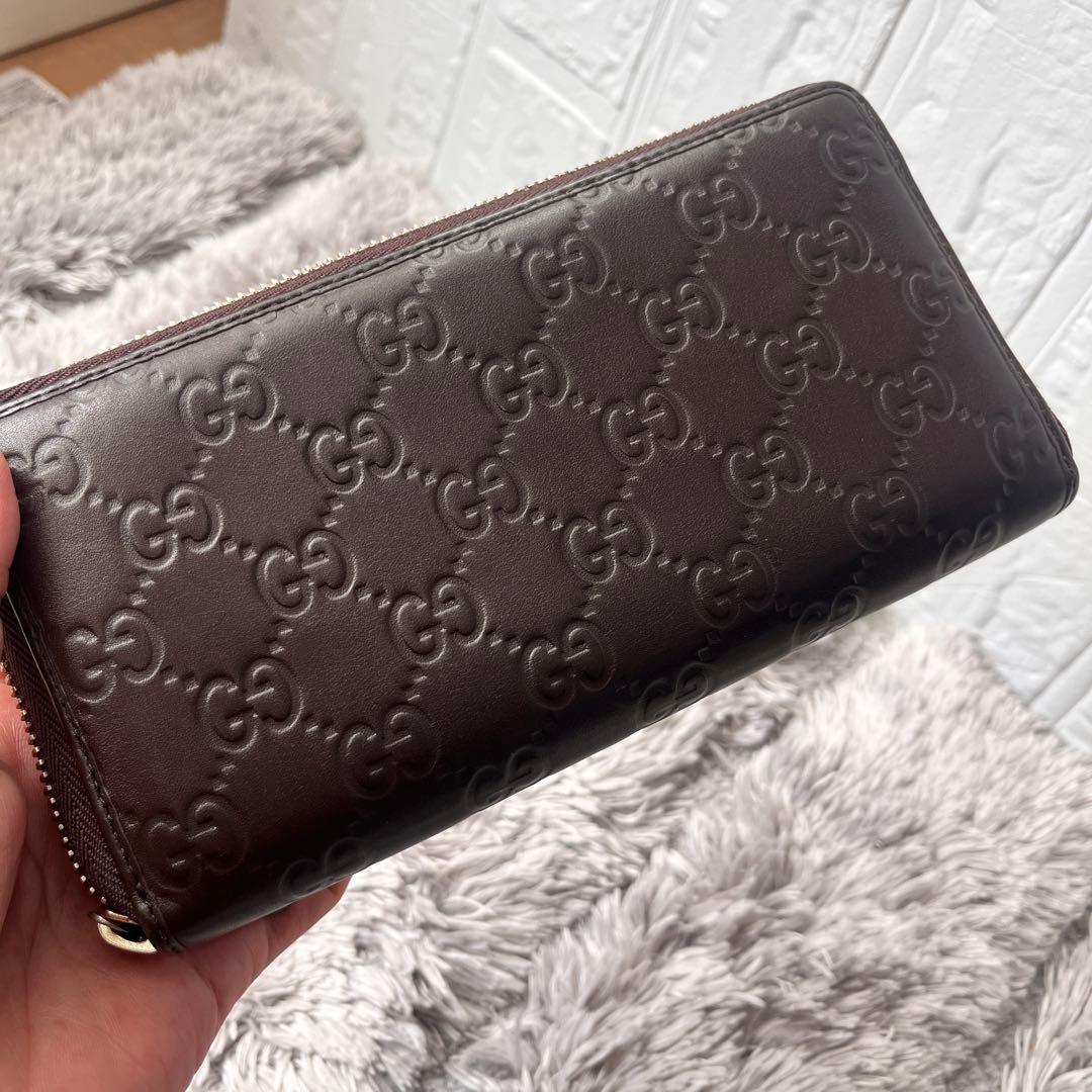 美品✨GUCCI ラウンドファスナー　シマ　リボン　ブラウン　長財布　レディース