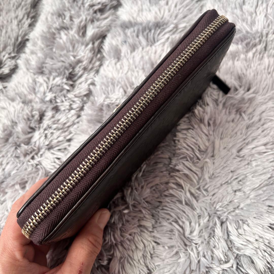 美品✨GUCCI ラウンドファスナー　シマ　リボン　ブラウン　長財布　レディース