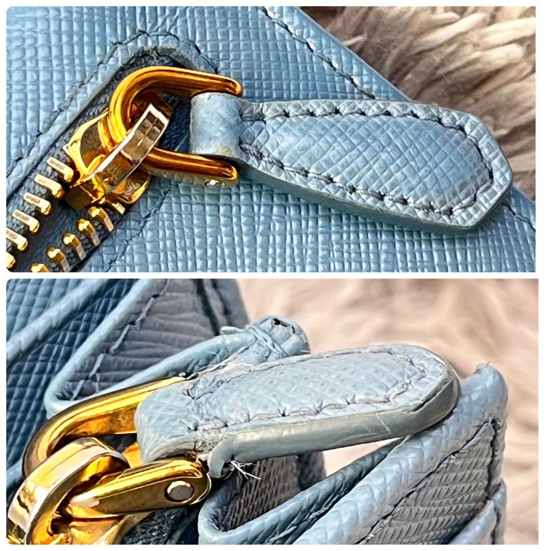良品✨PRADA メタルバー　メタルロゴ　長財布 サフィアーノ　水色　レディース