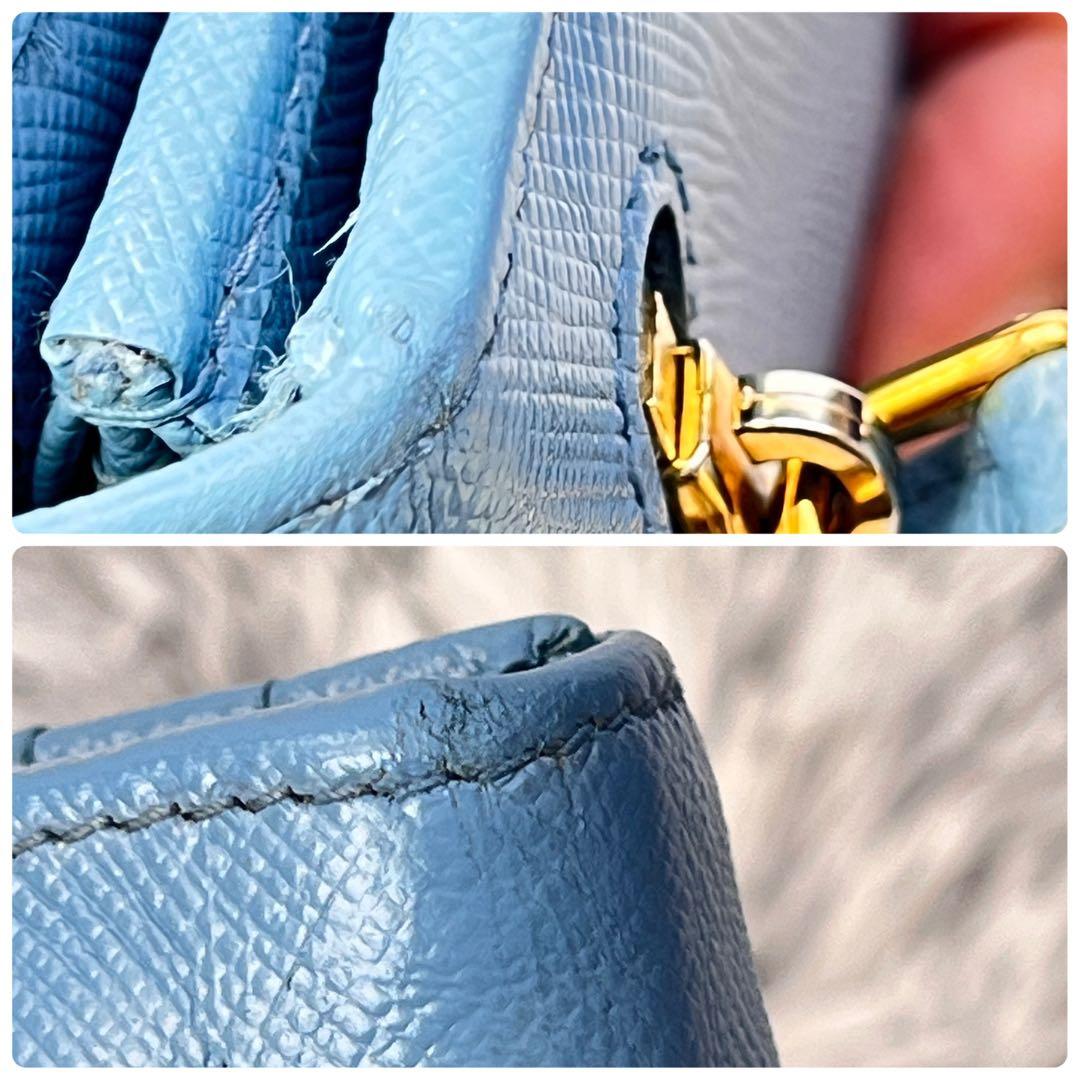 良品✨PRADA メタルバー　メタルロゴ　長財布 サフィアーノ　水色　レディース