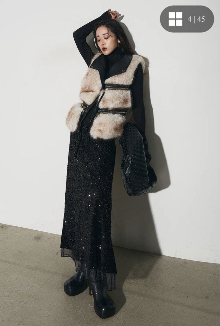 Andrea＆co. フェイクファーライダースベスト＋スパンコールスカート