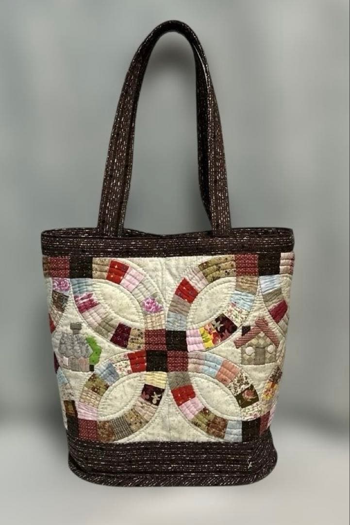 ダブルウェディングリングとハウスの大きめショルダー