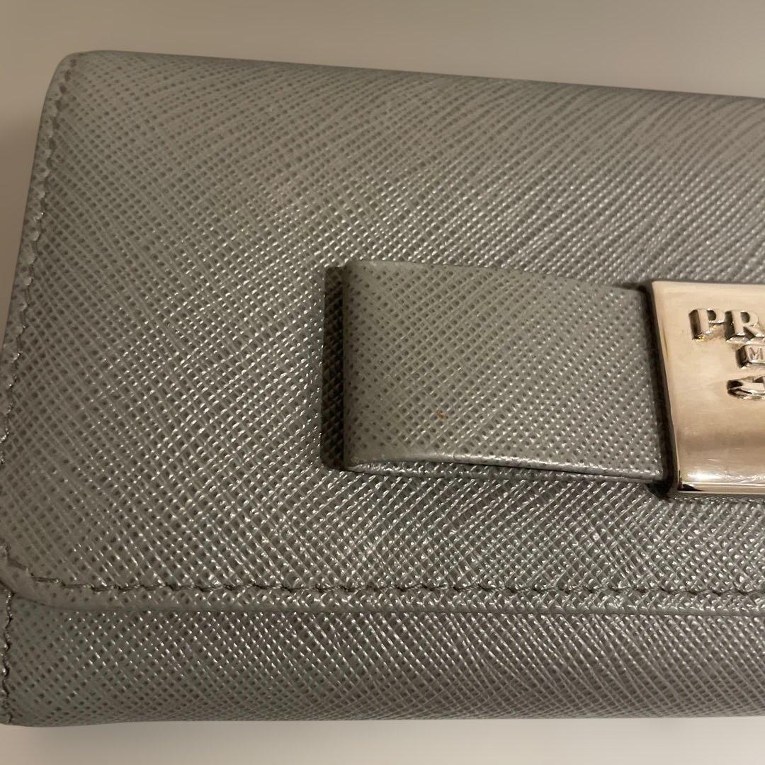 ◉PRADA プラダ　長財布 サフィアーノ　レザー リボン グレー