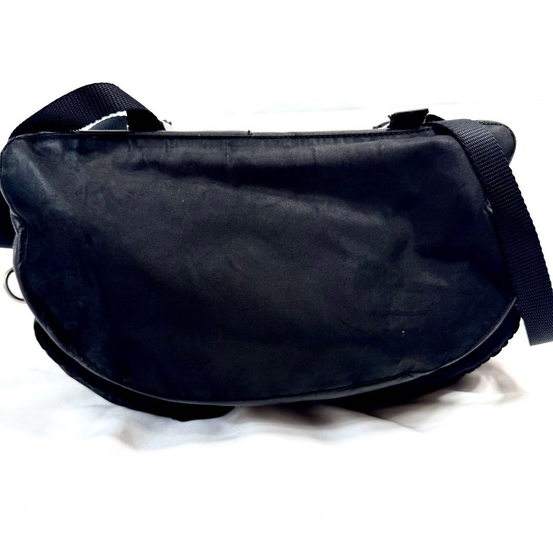 PRADA リュック ナイロン 三角 プレート 巾着 マルチポケット レザー