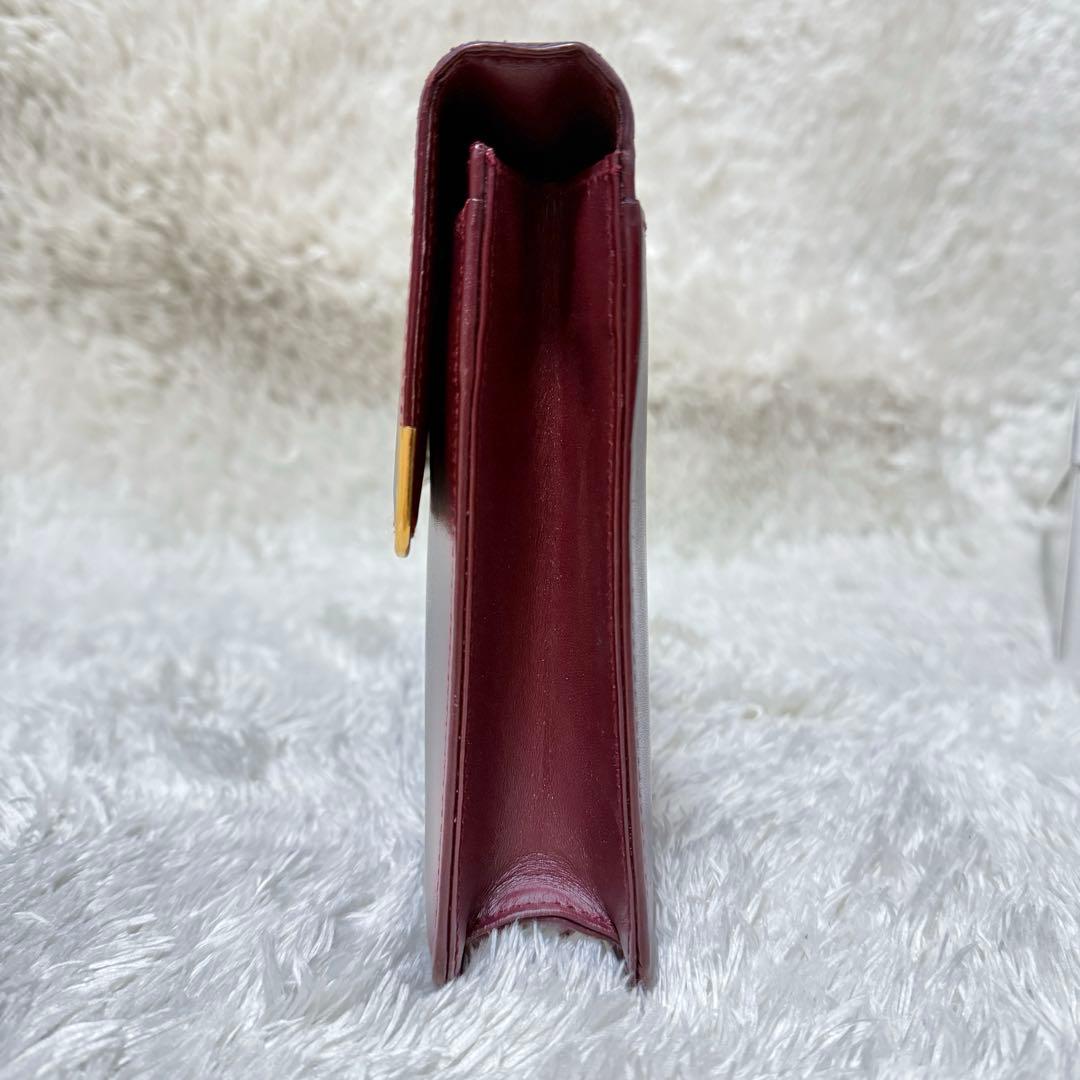 カルティエ　マストライン　クラッチバッグ　ボルドー　ロゴ金具