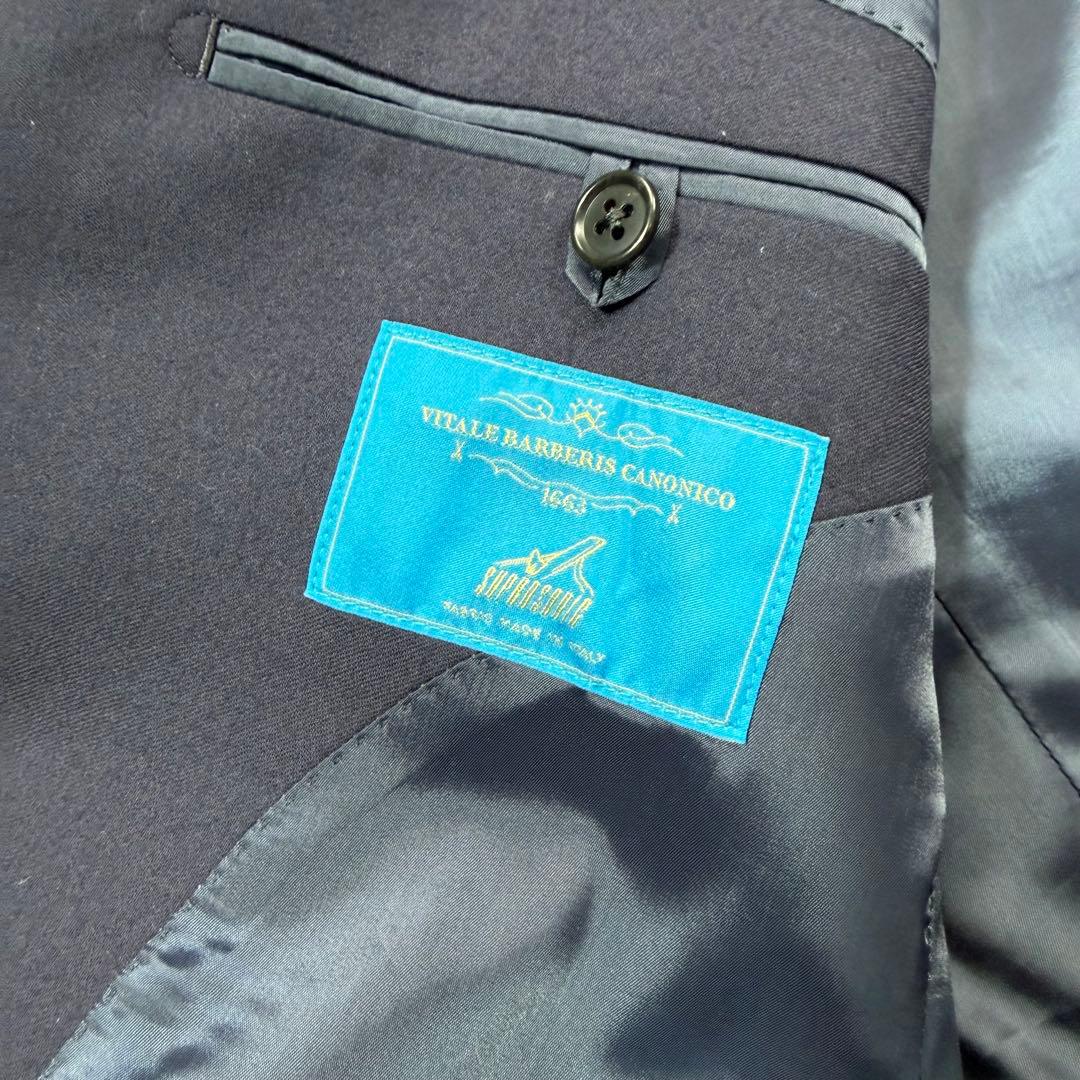 極美品 ユニバーサルランゲージ カノニコ 本切羽 ネイビー セットアップ L