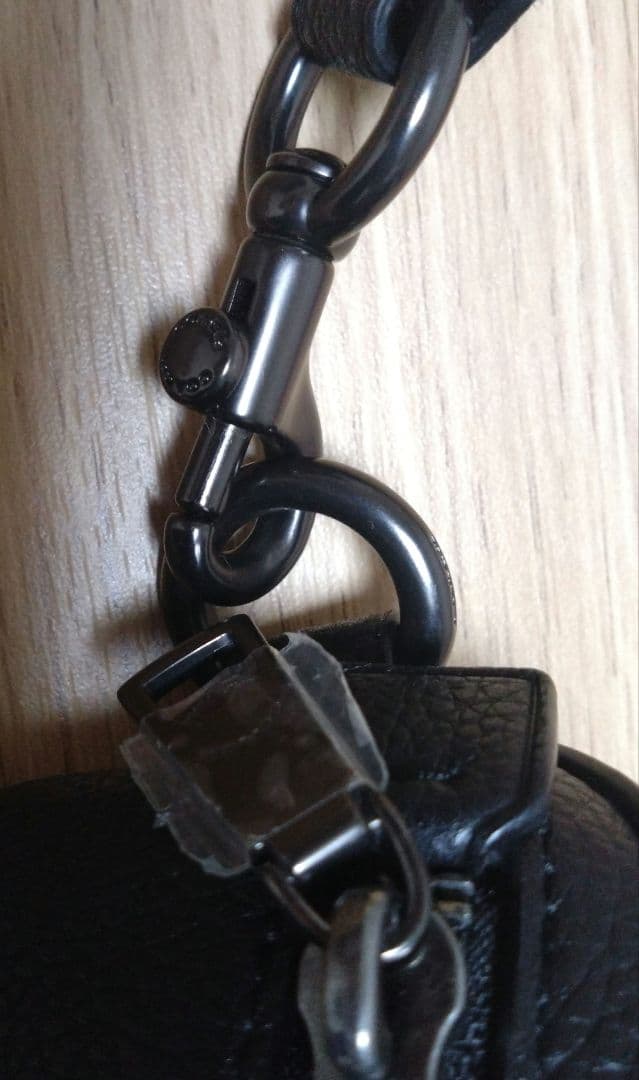 COACH恐竜柄革ウエストポーチ