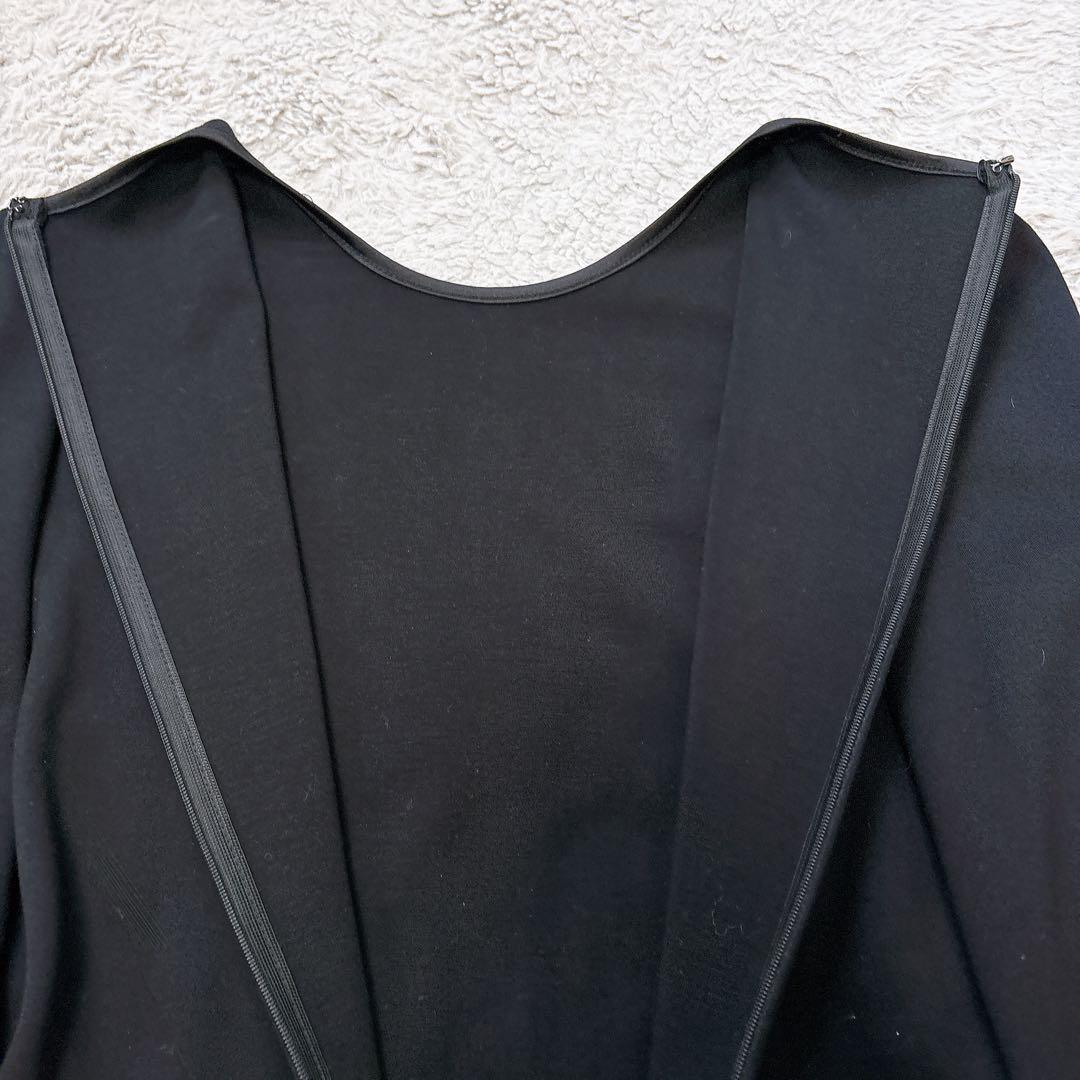 美品✨ボーダーズアットバルコニー　ストレッチ　ペプラムトップス　ロゴ　ネイビー