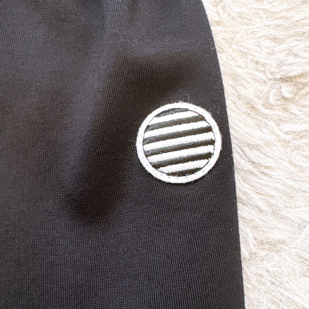 美品✨ボーダーズアットバルコニー　ストレッチ　ペプラムトップス　ロゴ　ネイビー