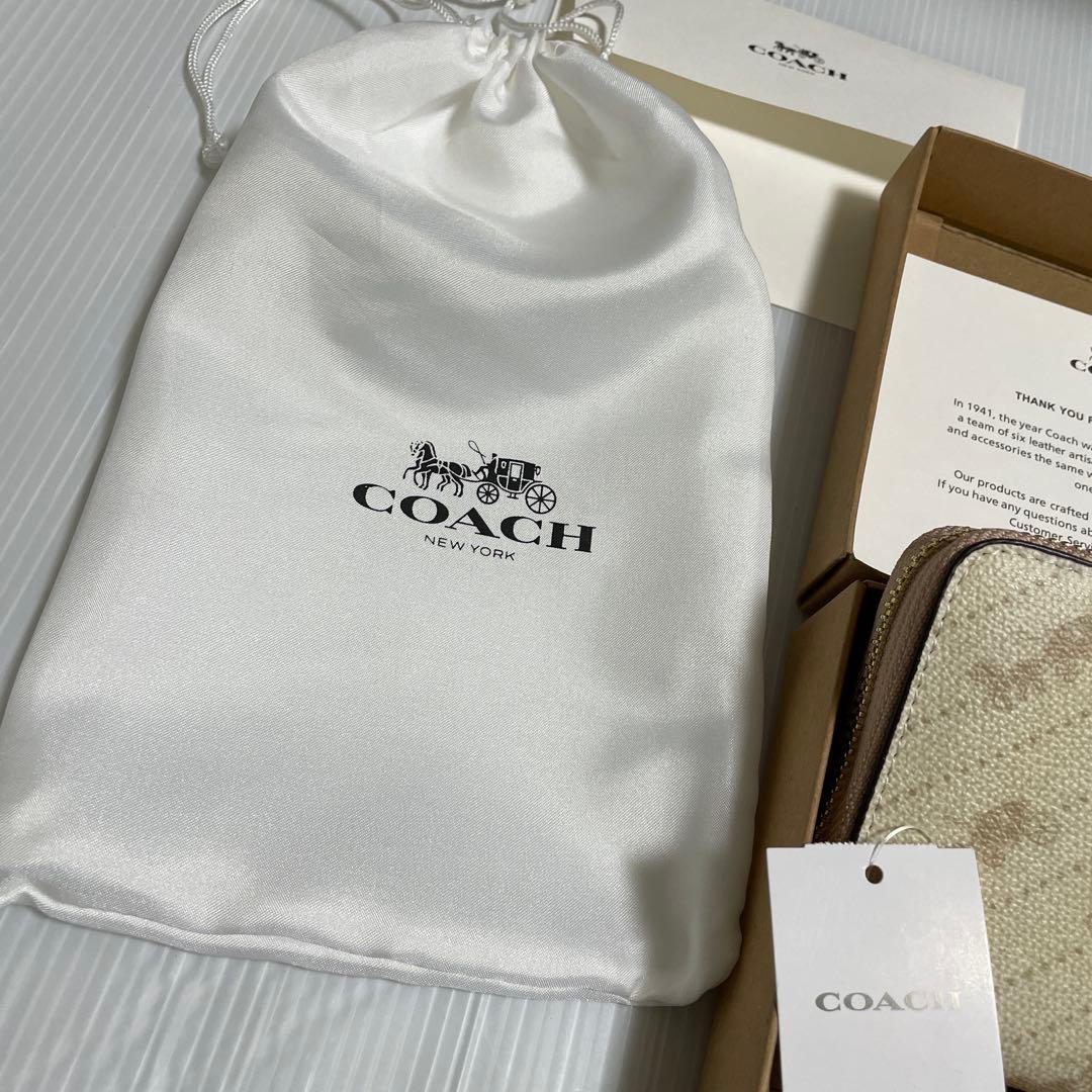新品✨️ COACH 長財布 馬車ロゴ ホースアンドキャリッジ ストラップ付き
