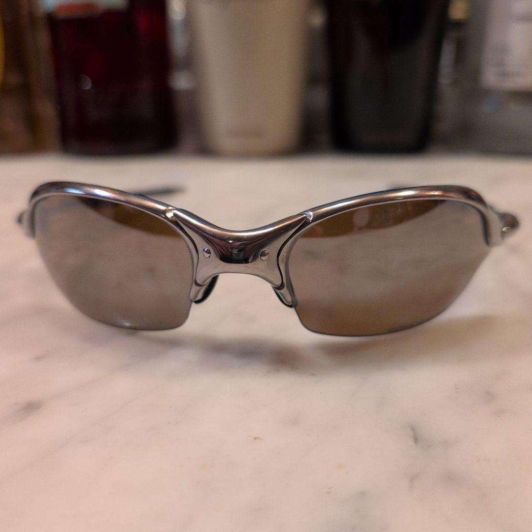 Oakley サングラス ブラウンレンズ シルバーフレームチタンカラーレンズ