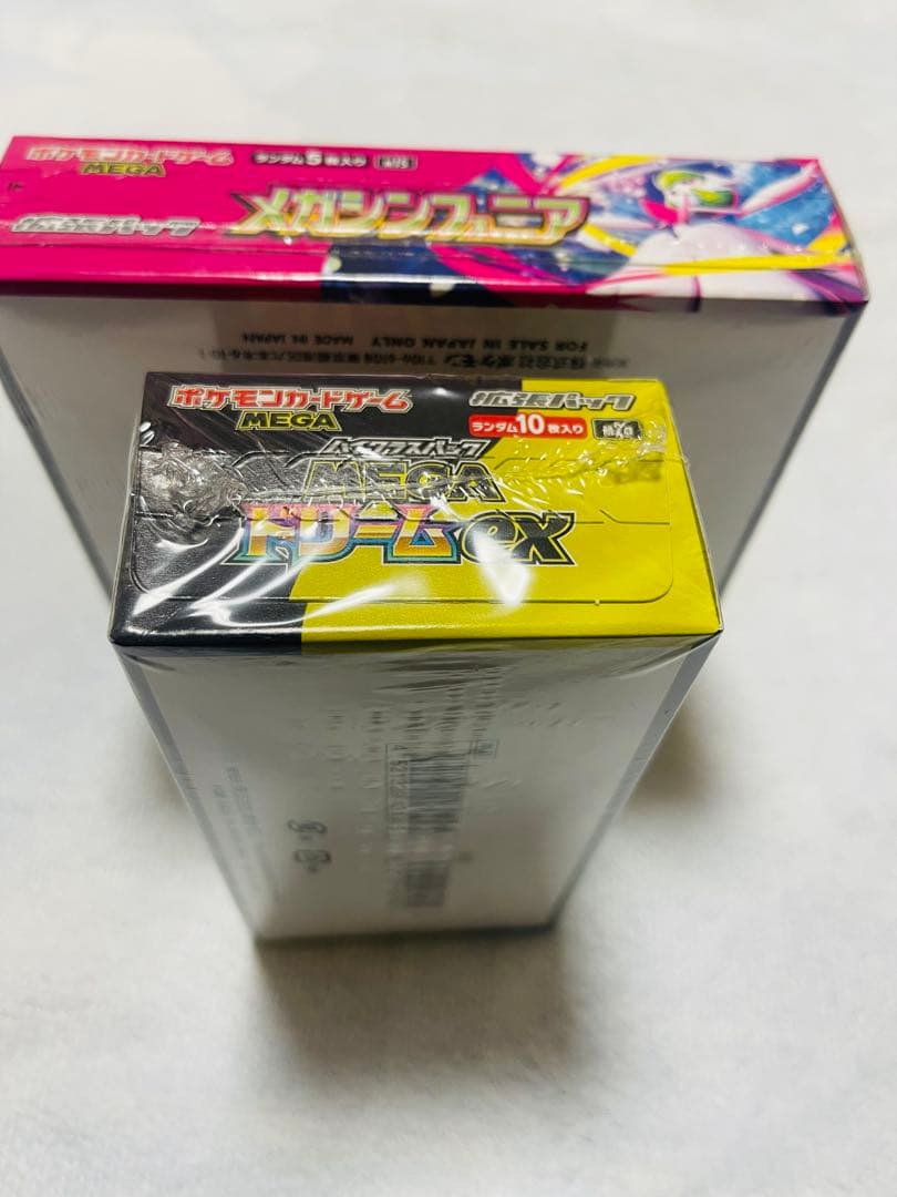 シュリンク付きのポケモンカードゲーム メガドリームEXとメガシンフォニア