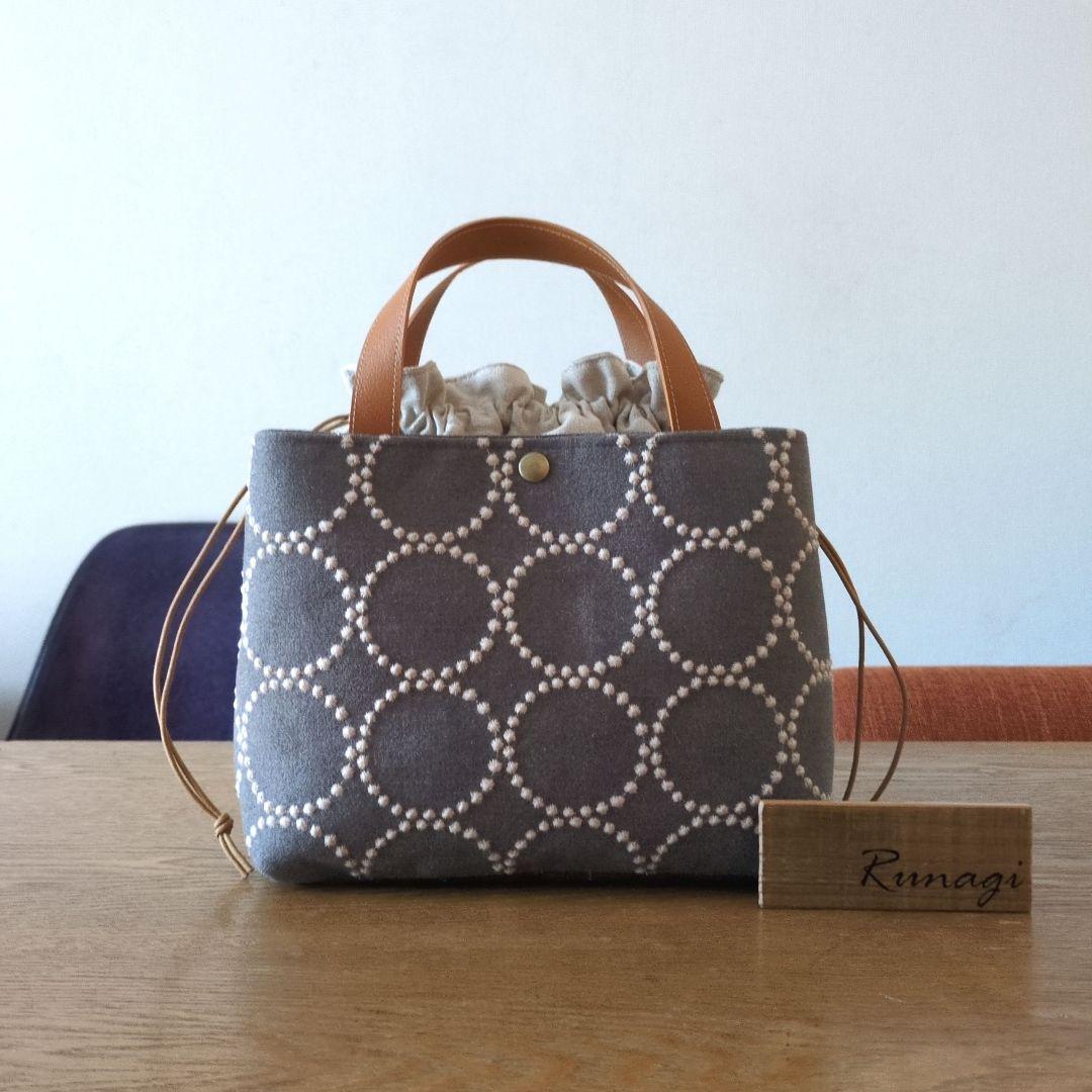 【1572】あおりポケットの巾着バッグ＊ミナペルホネン