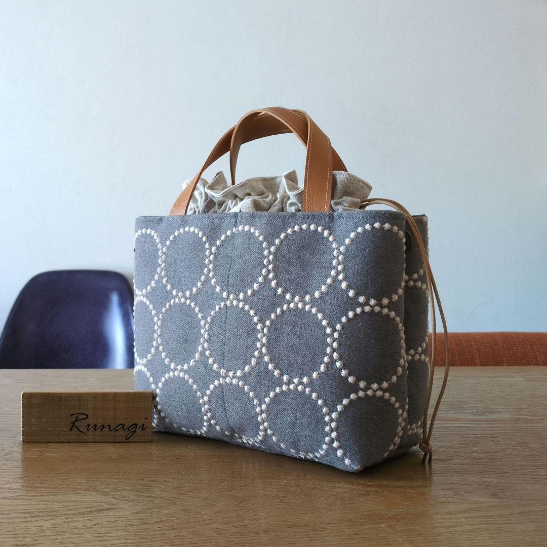 【1572】あおりポケットの巾着バッグ＊ミナペルホネン