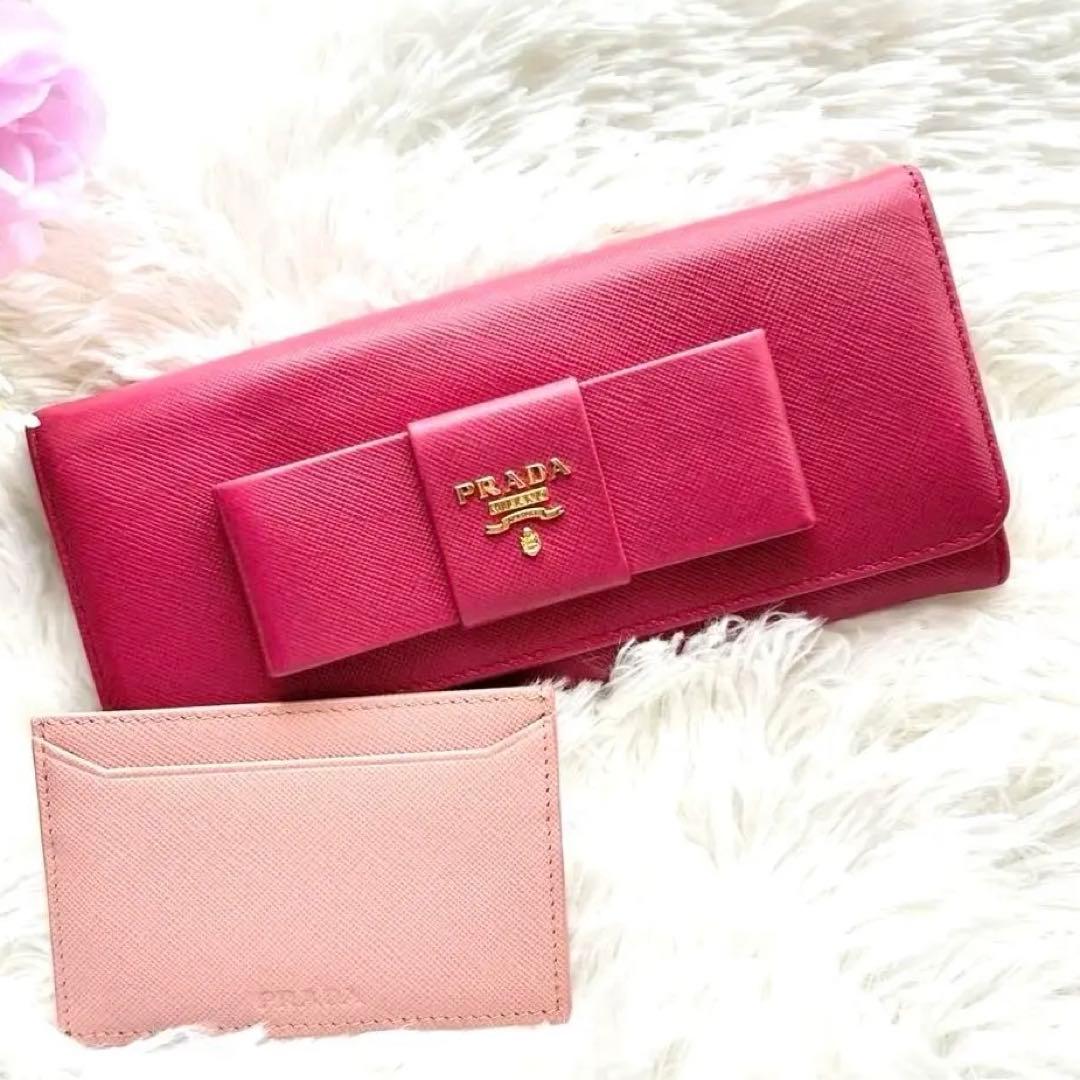 美品✨プラダ 長財布 サフィアーノ フィオッコ ピンク メタルロゴ リボン