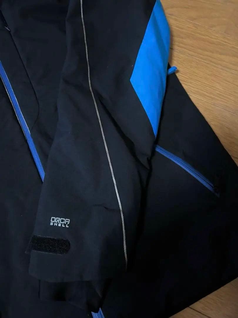 未使用 Phenix フェニックス スキーウェア ジャケット 黒/青 メンズM