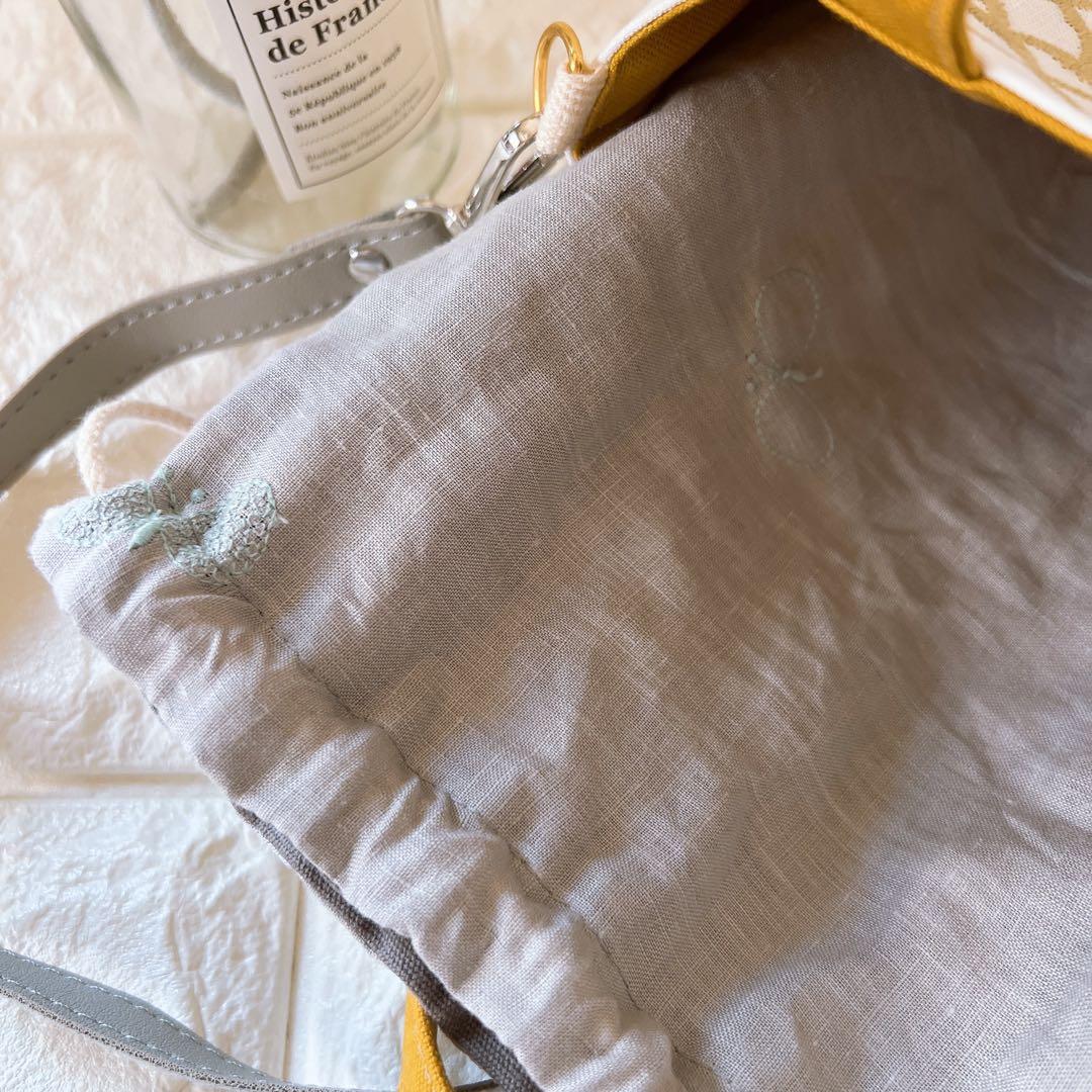 ミナペルホネン ハンドメイド あおりポケット巾着バッグ バッグ ショルダーバッグ