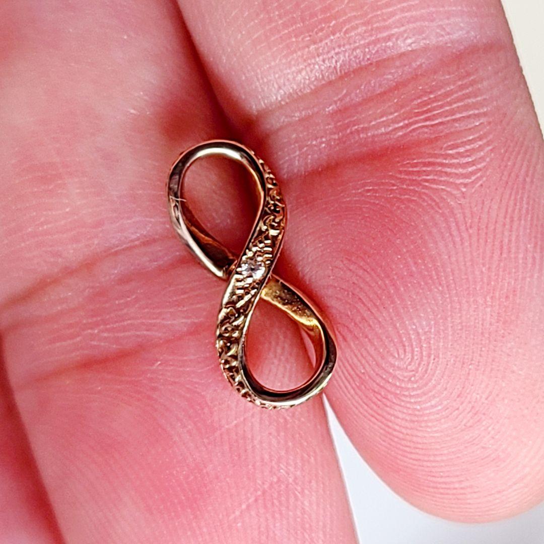 agete　アガット　K10　インフィニティ&リボン　チャーム　鏡リュウジ