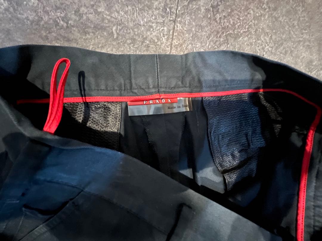PRADA |サイドジッパー付きパンツ　赤タグプラダ