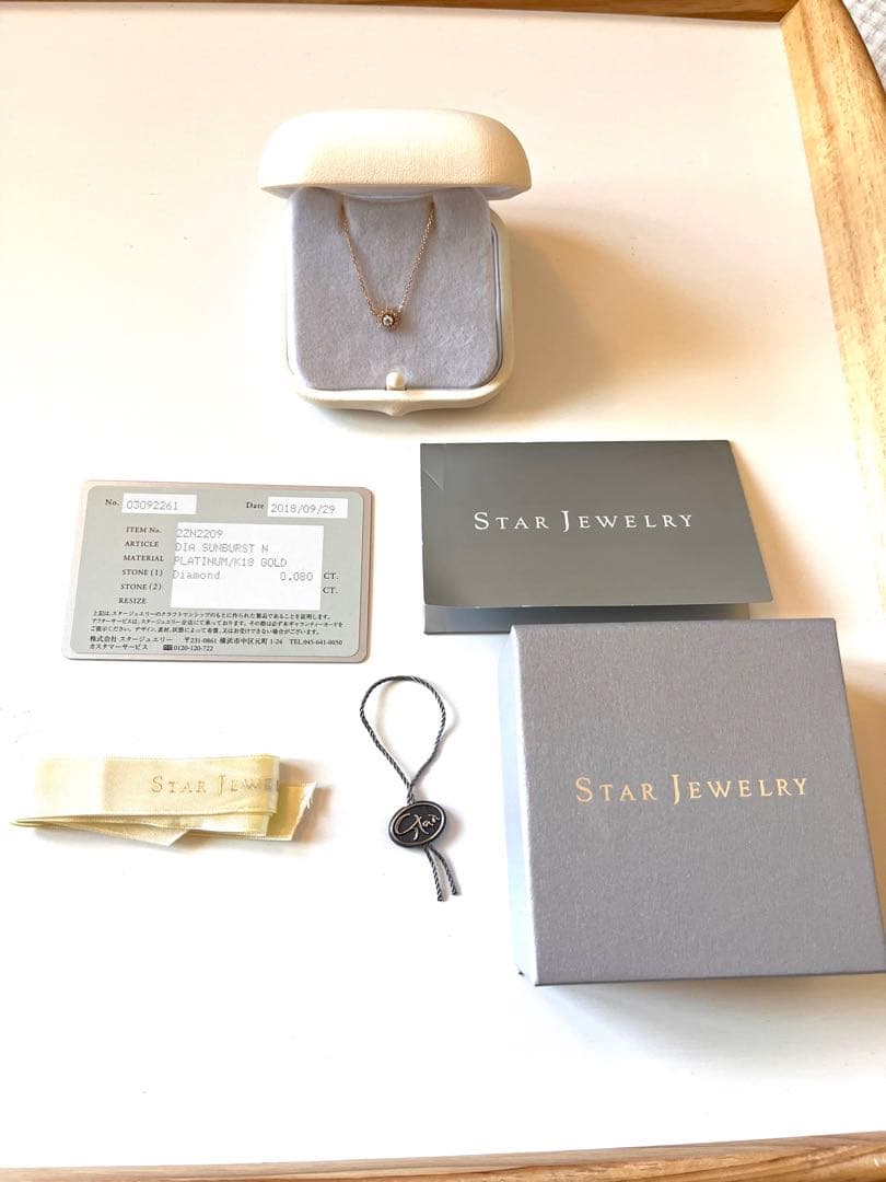 STAR JEWELRY SUNBURST K18YG/Pt950ダイヤモンド