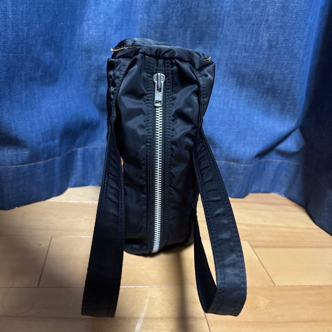 ポータータンカーブラック ×オレンジナイロン ドラムバッグ