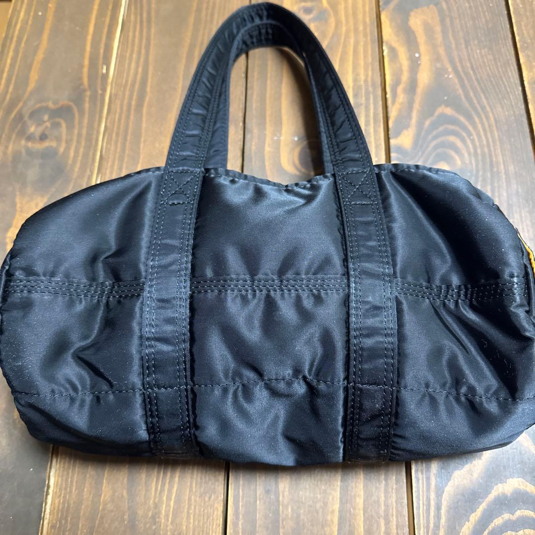 ポータータンカーブラック ×オレンジナイロン ドラムバッグ