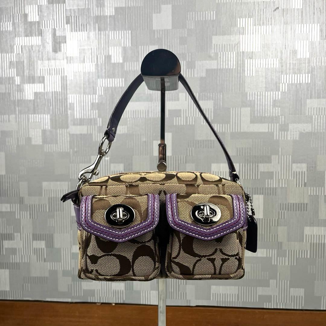 極美品 COACH コーチ アクセサリーポーチ ターンロック レガシー パープル