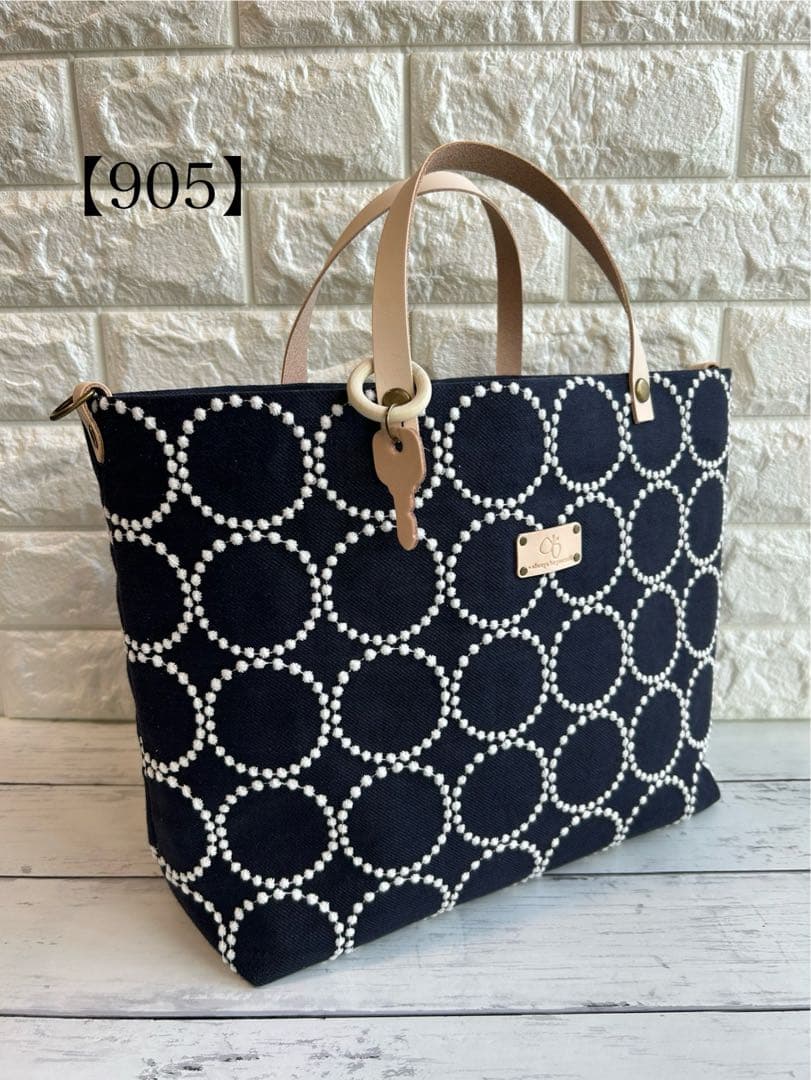 【905】ミナペルホネンタンバリンネイビー　トートバッグ　持ち手ヌメ革製