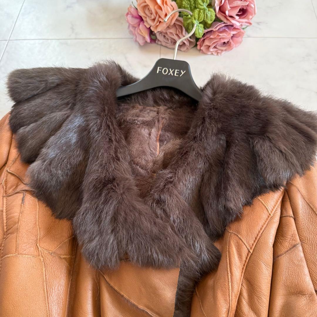 美品★ラビットファー 毛皮 羊革 女優襟 ロングベルテッドコート フリル L