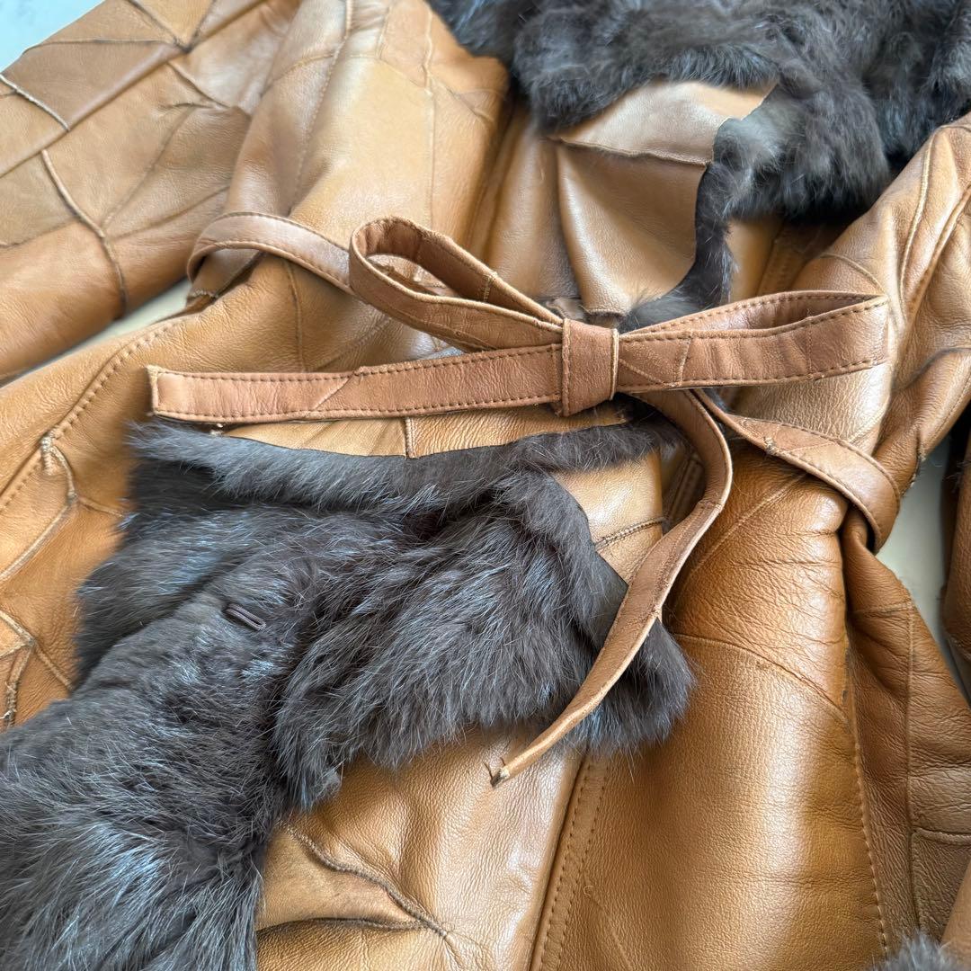 美品★ラビットファー 毛皮 羊革 女優襟 ロングベルテッドコート フリル L