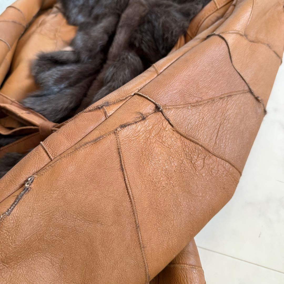 美品★ラビットファー 毛皮 羊革 女優襟 ロングベルテッドコート フリル L