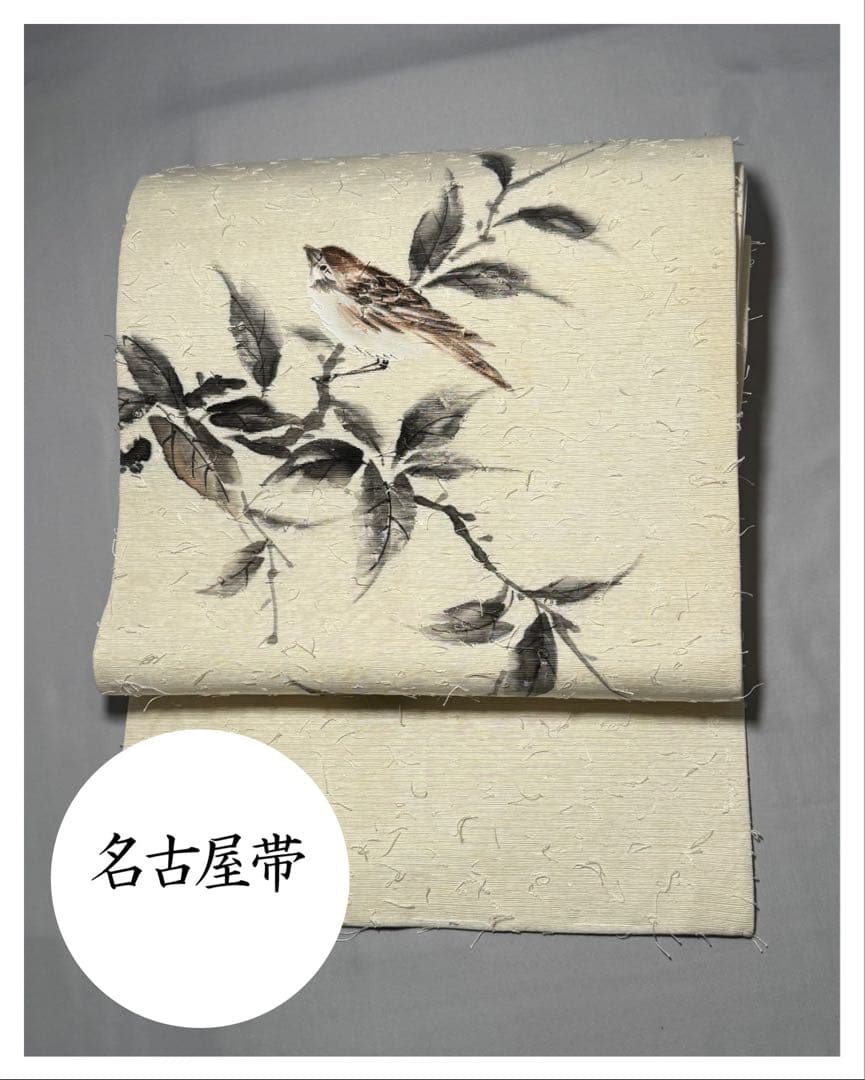 [美品] 髭紬　名古屋帯　正絹　お太鼓柄　雀　白練色　洒落帯　小紋　紬　無地