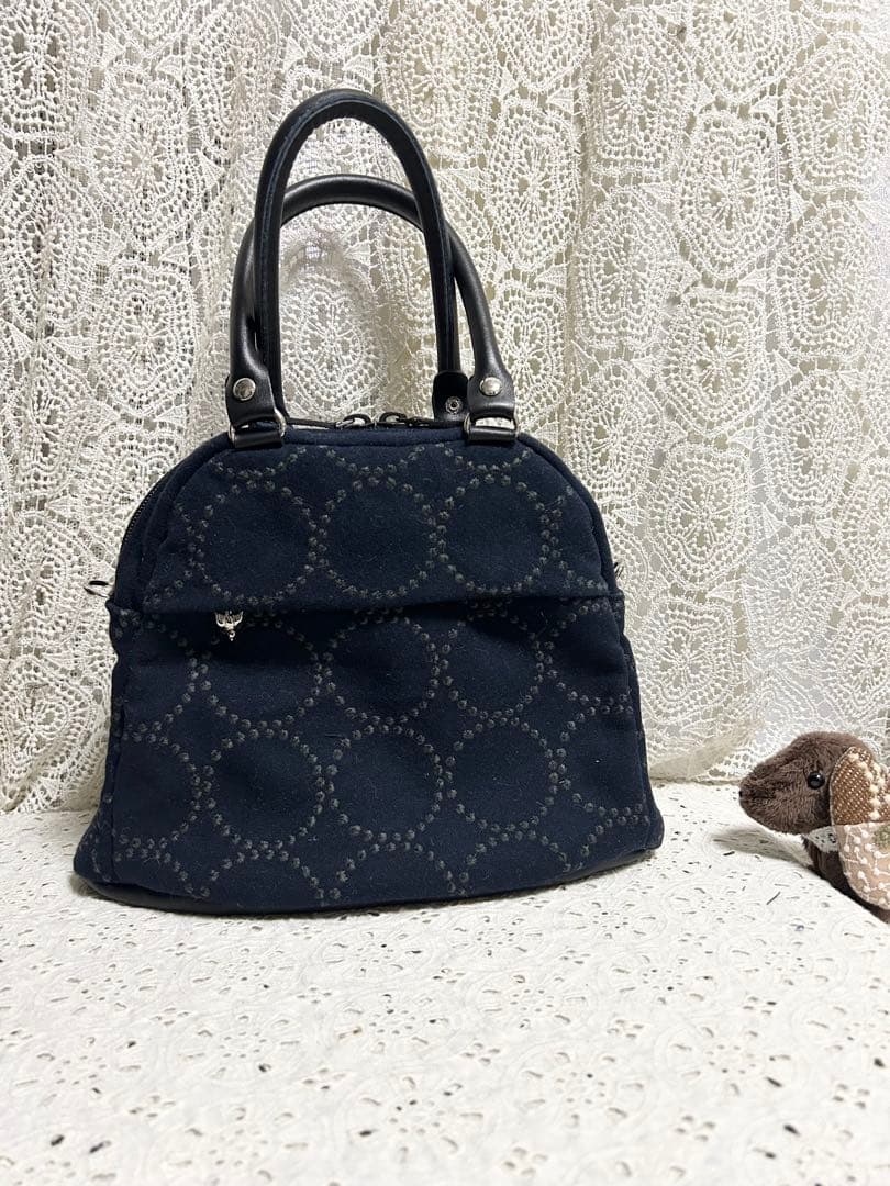 51227Aミナペルホネンハンドメイド　ブガッティラウンドバッグ