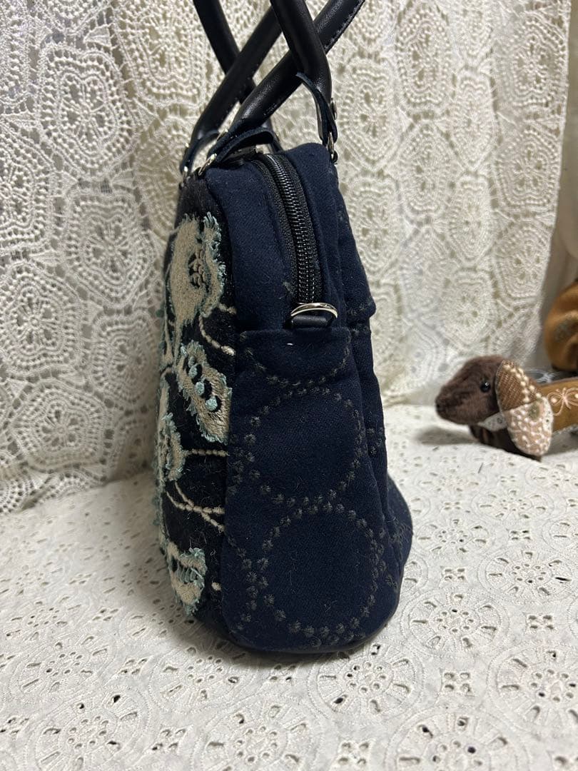 51227Aミナペルホネンハンドメイド　ブガッティラウンドバッグ