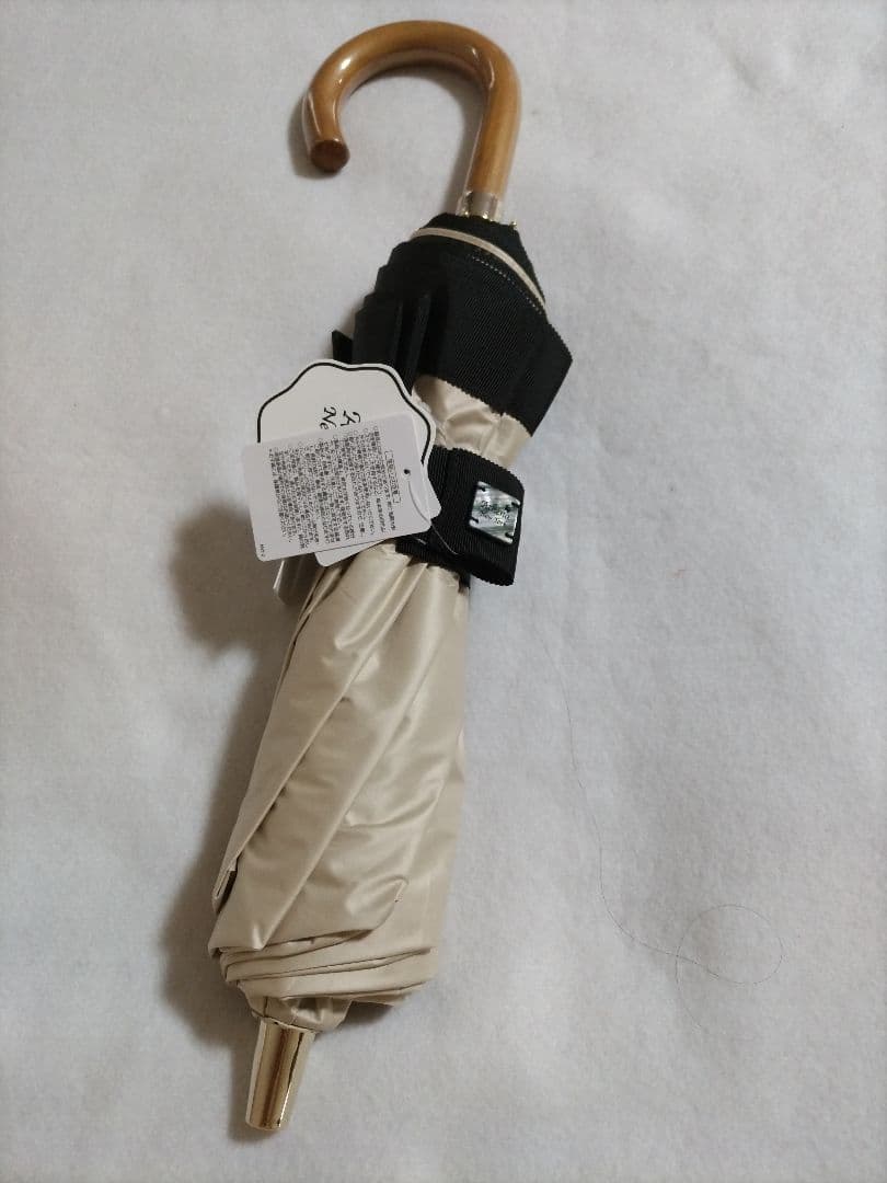 新品　アシーナニューヨーク 折りたたみ傘 晴雨兼用 ベージュ/黒