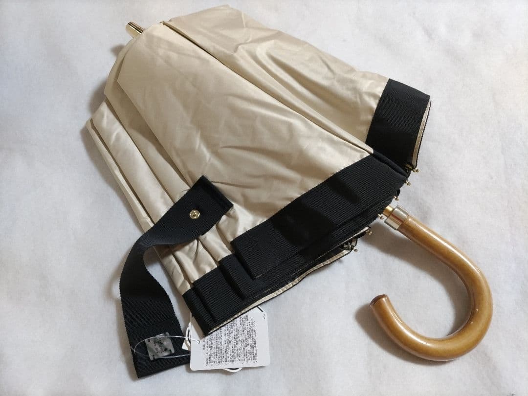 新品　アシーナニューヨーク 折りたたみ傘 晴雨兼用 ベージュ/黒